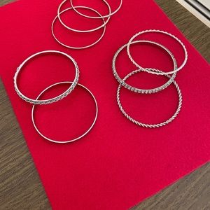 Eight stackable silver bangles